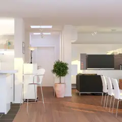 Ampio open space moderno con cucina, zona pranzo e soggiorno. Tavolo in legno con sedie bianche, divano nero, TV e libreria.