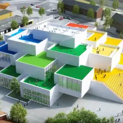 Il progetto di Bjarke Ingels per il LEGO House, con i suoi tetti colorati e le forme a blocchi, sembra un'opera d'arte vivente.
