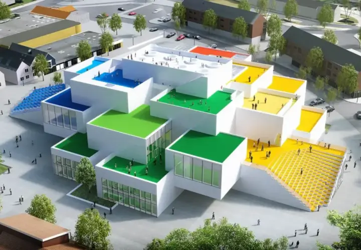 Il progetto di Bjarke Ingels per il LEGO House, con i suoi tetti colorati e le forme a blocchi, sembra un'opera d'arte vivente.