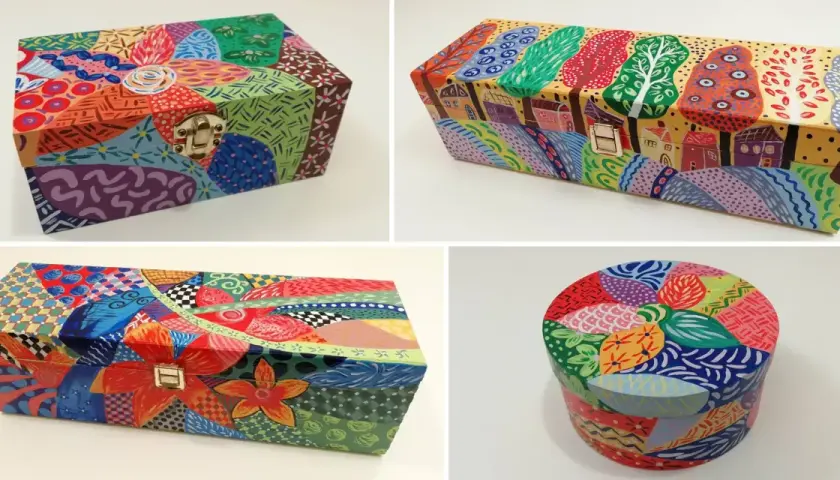 Scatole di legno decorate fai da te con motivi astratti e floreali colorati, un'esplosione di creatività.