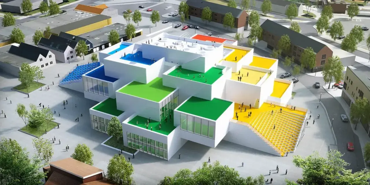 Il progetto di Bjarke Ingels per il LEGO House, con i suoi tetti colorati e le forme a blocchi, sembra un'opera d'arte vivente.