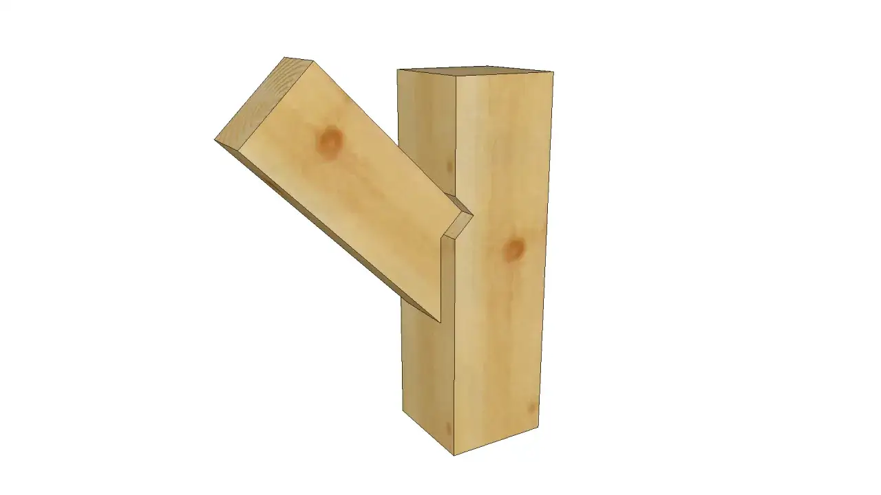 Unione a incastro di due travi in legno, mostrando come unire due travi in legno con un taglio preciso per una giunzione robusta.